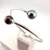 Bracelet 'Toi & Moi' en argent 925 rhodié, 2 perles de Tahiti, ronde cat. B 9,7mm bleu / semi-ronde cat. C 9,6mm aubergine