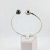 Bracelet 'Toi & Moi' en argent 925 rhodié, 2 perles de Tahiti rondes cat. B 9,5mm vert foncé / cat. C 9,2mm gris doré