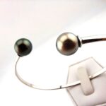 Bracelet 'Toi & Moi' en argent 925 rhodié, 2 perles de Tahiti rondes cat. B 9,5mm vert foncé / cat. C 9,2mm gris doré