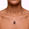 Pendentif 'fleur' en argent 925 plaqué or rose, 1 perle de Tahiti ronde, catégorie B, 9.5mm, bleu vert