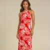Robe longue XANTIA, légère et faite main, aux motifs tropicaux. Création exclusive COCOBLANC, disponible à Moorea, en Polynésie française.