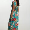 Robe longue STEFY 2-en-1, faite main, aux motifs tropicaux. Création exclusive COCOBLANC, disponible à Moorea, en Polynésie française.